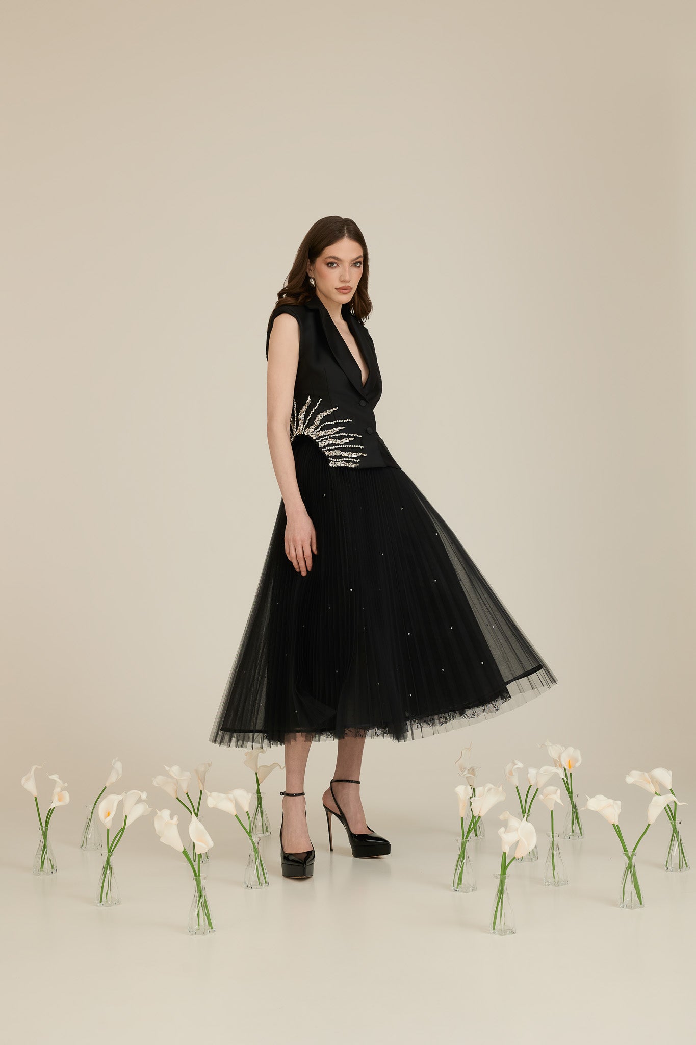 Elegant Ensemble with Tulle Skirt and Crescent Crystal-Embellished Vest